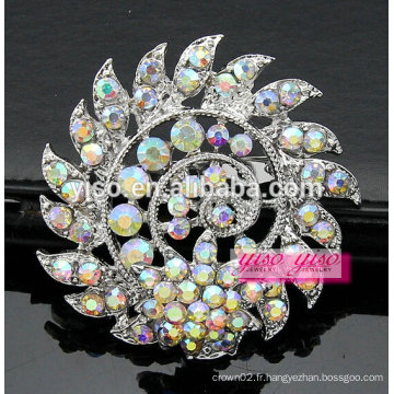 Broche en cristal de pierre en or et en argent spirale spirale florale